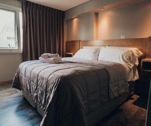 Hotel EcoSki by bund客房内的一张或多张床位