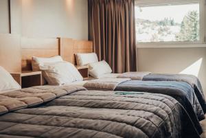 Hotel EcoSki by bund客房内的一张或多张床位