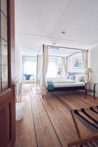 Llit o llits en una habitació de Chez Muna & Lucien