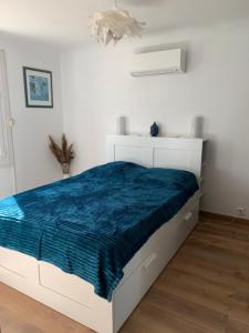 Postel nebo postele na pokoji v ubytování Maison 5mn de la mer