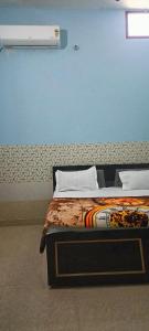 Krevet ili kreveti u jedinici u objektu Ram Guest House