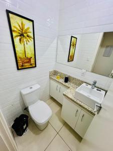 Vonios kambarys apgyvendinimo įstaigoje Excepcional Apto no Coração de Lindóia com Wi-Fi e Garagem
