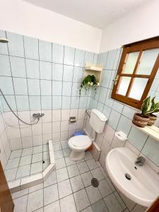 Koupelna v ubytování Guesthouse Rondo