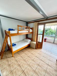 Postel nebo postele na pokoji v ubytování Guesthouse Rondo
