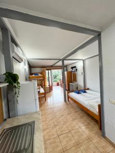 Postel nebo postele na pokoji v ubytování Guesthouse Rondo