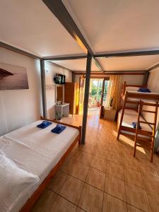 Postel nebo postele na pokoji v ubytování Guesthouse Rondo