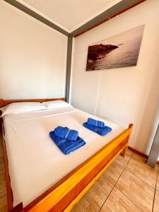 Postel nebo postele na pokoji v ubytování Guesthouse Rondo