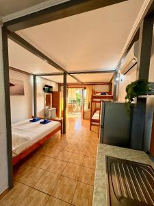 Postel nebo postele na pokoji v ubytování Guesthouse Rondo