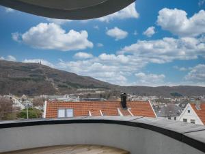 a view of a city from the roof of a house at Scandinavian Style Apartement! Balcony and Stunning Views! in Bergen