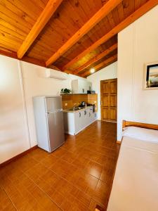Kuchyň nebo kuchyňský kout v ubytování Guesthouse Rondo