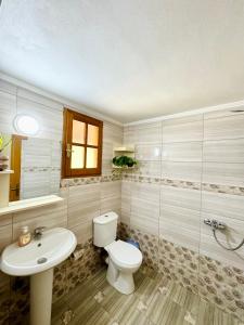 Koupelna v ubytování Guesthouse Rondo