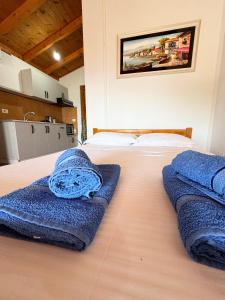 Postel nebo postele na pokoji v ubytování Guesthouse Rondo