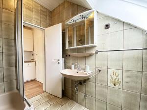 Ένα μπάνιο στο Ferien im Wangerland - Haus Wiesenweg - Apartment 3 1OG +8 φωτογραφίες