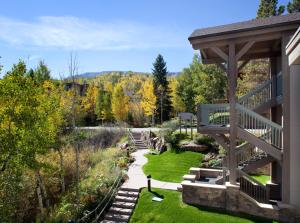 a view of a garden from a house at Terracehouse - CoralTree Residence Collection in Snowmass Village