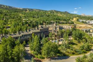 an aerial view of a resort in the mountains at Woodrun Place in Snowmass Village