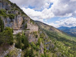 a building on the side of a mountain at Casa Vacanze Lappe in Pratola Peligna