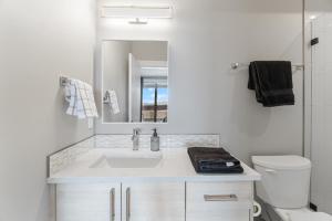A bathroom at Luxury Home with Amazing Lake Okanagan Views