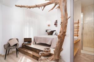 Ένα ή περισσότερα κρεβάτια σε δωμάτιο στο Giojas 125