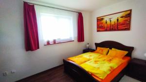 Postel nebo postele na pokoji v ubytování Apartmán SCHEYER