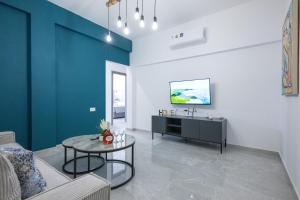 TV a/nebo společenská místnost v ubytování Bellagio Napa Suites