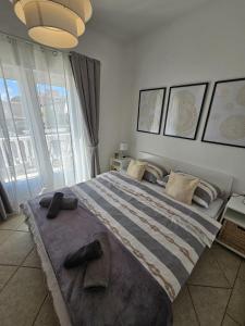 Postel nebo postele na pokoji v ubytování Apartment Melani
