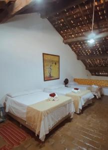 Letto o letti in una camera di Casa de Olinda