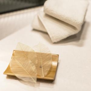 Letto o letti in una camera di Stanford Hillview Hotel Hong Kong