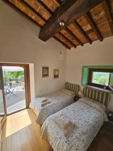A bed or beds in a room at Villa delle lucciole Még 25 kép