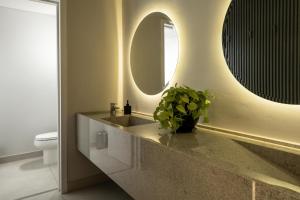 Kylpyhuone majoituspaikassa ZT Coliving and Hotel