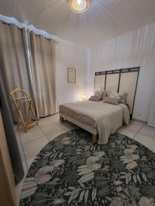 Postel nebo postele na pokoji v ubytování Charmant appartement