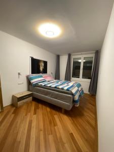 Ένα ή περισσότερα κρεβάτια σε δωμάτιο στο NeicApartmentLandskron 1010