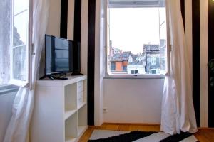 TV a/nebo společenská místnost v ubytování Grace's elegant suite