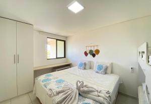 Postel nebo postele na pokoji v ubytování Lindo Flat Praia dos Carneiros - Carneiros Beach Resort + 21 fotografií