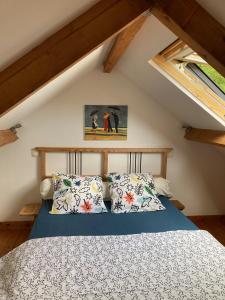 a bedroom with a bed in a attic at Penty au Ménec in Carnac