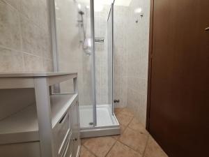 a bathroom with a shower and a sink and a shower at Agriturismo Tre Cerri di Zanaboni Franca in Orbetello