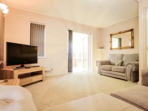 Et tv og/eller underholdning på Rider Gardens Holiday House