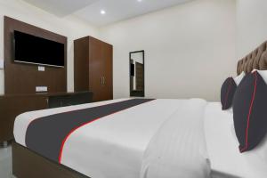 Voodi või voodid majutusasutuse OYO Flagship Hotel Mannat Bhera Enclave toas