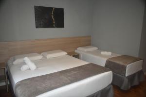 Letto o letti in una camera di Unity Hotel - Paulista - SP