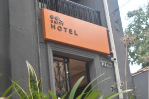 uma placa de hotel na lateral de um edifício em Unity Hotel - Paulista - SP em São Paulo