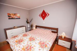 Postel nebo postele na pokoji v ubytování Apartments Saric