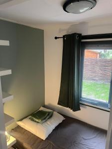Postel nebo postele na pokoji v ubytování Tapuit