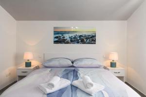 Postel nebo postele na pokoji v ubytování Rooms Anna