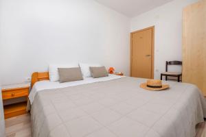 Ένα ή περισσότερα κρεβάτια σε δωμάτιο στο Apartment Prcela 2