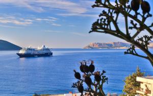 a cruise ship in a large body of water at Hotel Sonne - Adults Only in Kaş