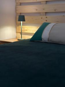 מיטה או מיטות בחדר ב-Casa Rosa