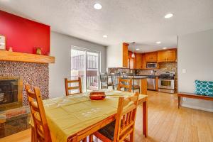 a dining room and kitchen with a table and chairs at Salt Lake City Home Close to Trails and Museums! in Salt Lake City