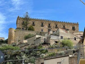an old building on top of a hill at Casa vacanza Helios in Leonforte