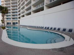 a large swimming pool in front of a building at Lighthouse By Liquid Life in Gulf Shores