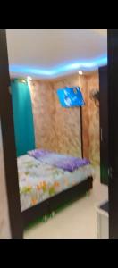 Ein Bett oder Betten in einem Zimmer der Unterkunft MaoMix