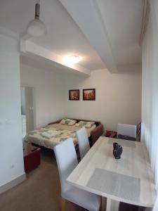 Postel nebo postele na pokoji v ubytování WING 3 apartman ,,BC ,,